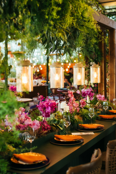 Decorated restaurant dining area with a lush botanical theme.